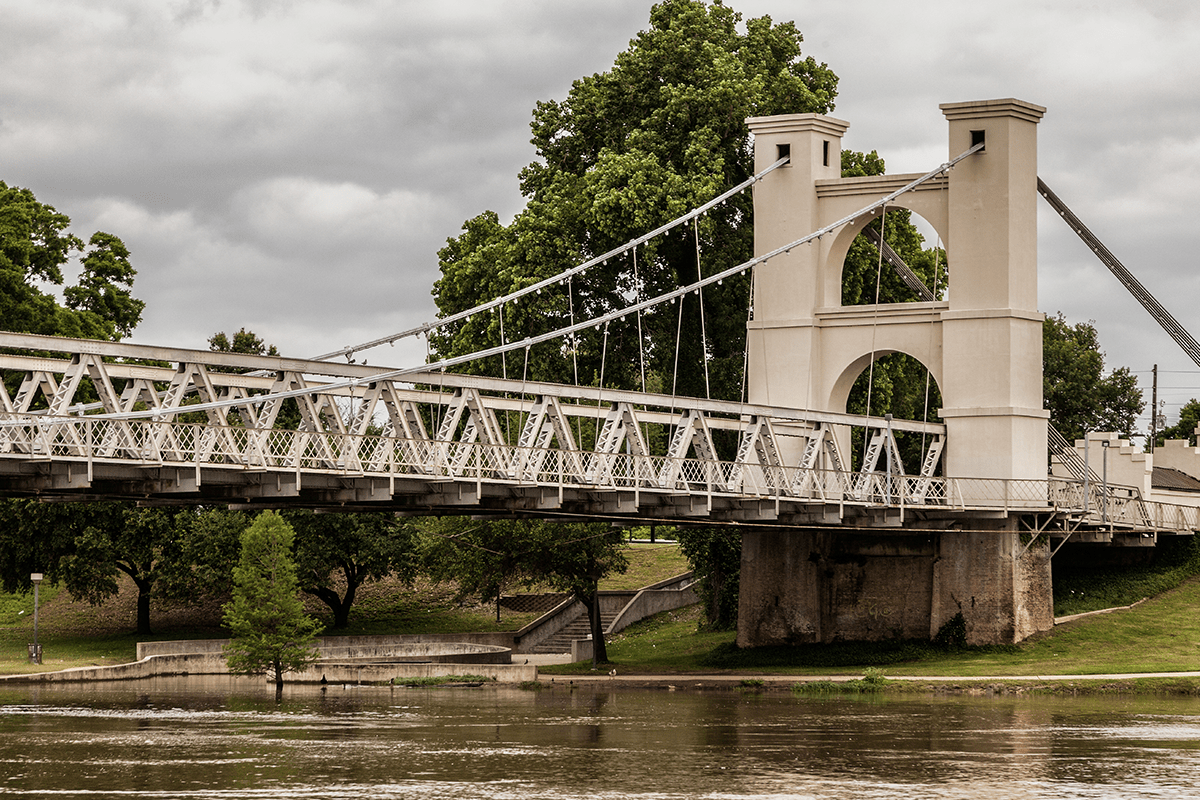 Waco Suspension Bridge. WM proudly supports Waco and neighboring areas with dumpster services.